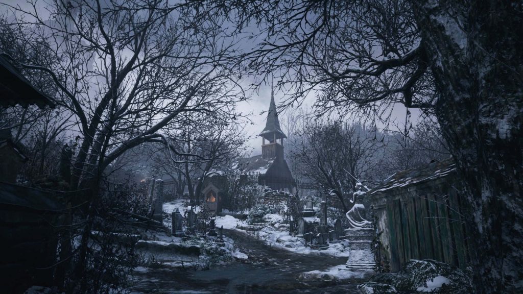Resident Evil Village snow-covered cemetery with gothic church and dark overcast sky wallpaper