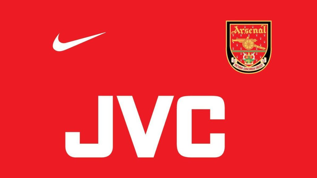 90s Arsenal FC wallpaper with JVC logo Nike swoosh and classic Arsenal crest on red background