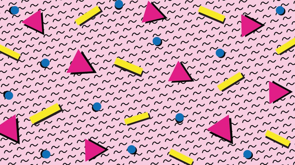 Memphis style wallpaper with pink background geometric triangles circles yellow bars abstract pattern