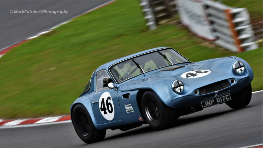Vintage Blue Sports Car Racing Wallpaper - Classic Design & Thrill