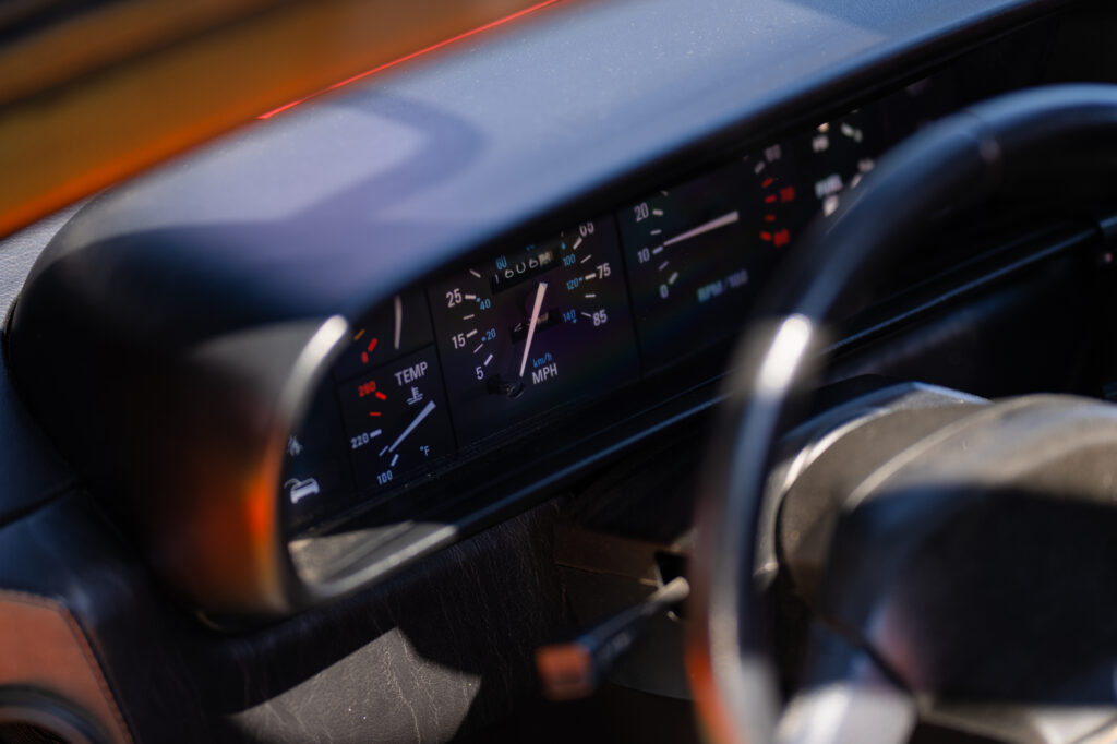 Retro Car Dashboard Close-Up: Classic Design & Nostalgic Charm Wallpaper