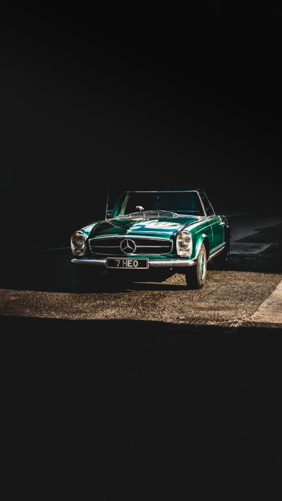 Retro Car Wallpaper: Classic Design & Nostalgic Shadowy Background