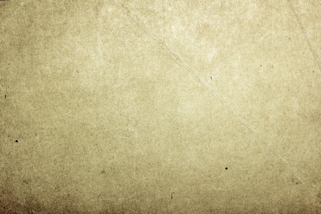 Authentic vintage paper texture with rustic sepia tones and subtle diagonal creases background Wallpaper