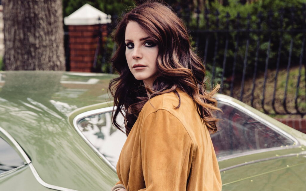 A Captivating Retro Portrait of the Beautiful Lana Del Rey: A Mesmerizing 4K Wallpaper Background