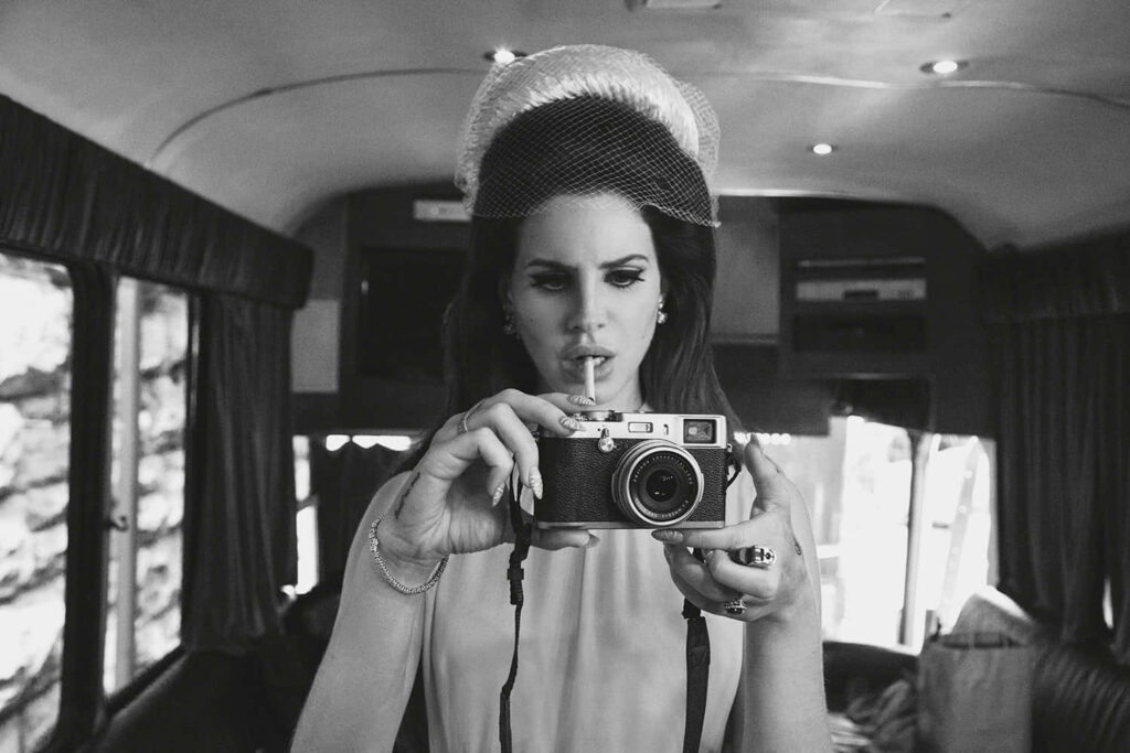 Timeless Lana Del Rey Black-and-White Vintage Camera Wallpaper