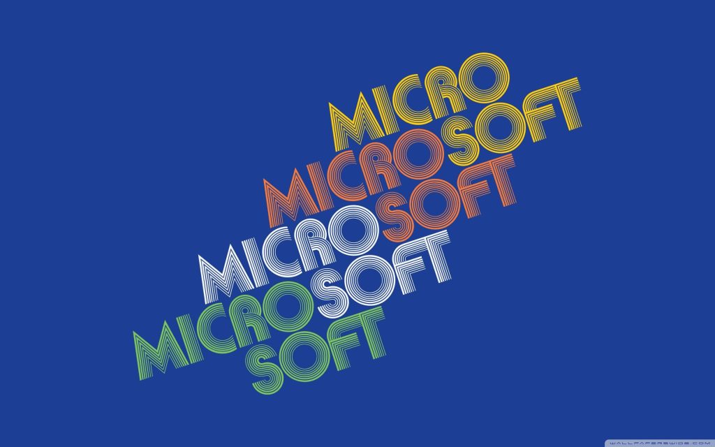 Digital wallpaper with repeated multicolored Microsoft logo on solid blue retro tech background