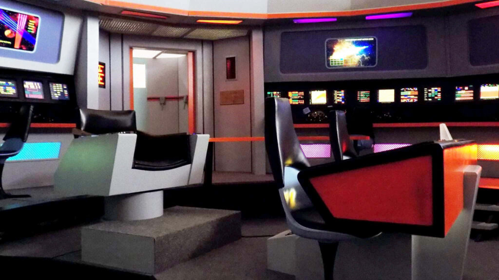 Retro Starship Enterprise Wallpaper: Iconic Control Panels & Lighting