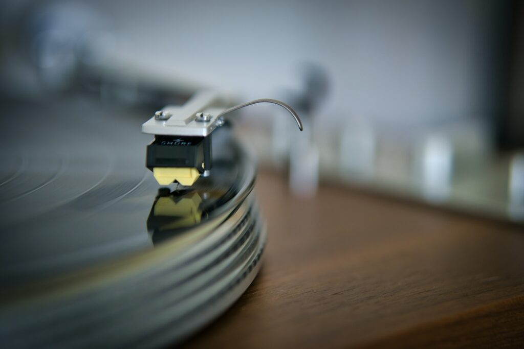 Vintage Turntable Needle on Vinyl Record - Retro Music Wallpaper