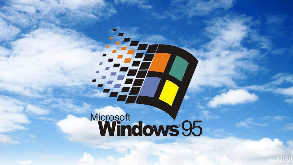 Classic Windows 95 logo with vibrant multicolored flag against bright blue sky wallpaper background