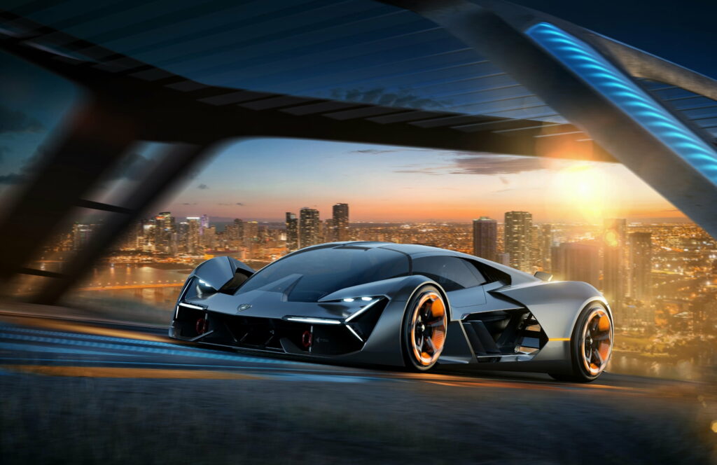 Lamborghini Terzo Millennio concept car with glowing orange wheels under futuristic archway sunset Wallpaper