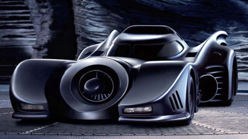 The Legendary Batmobile Awakens Gotham's Streets - Unleashing the Dark Knight's Drive Wallpaper