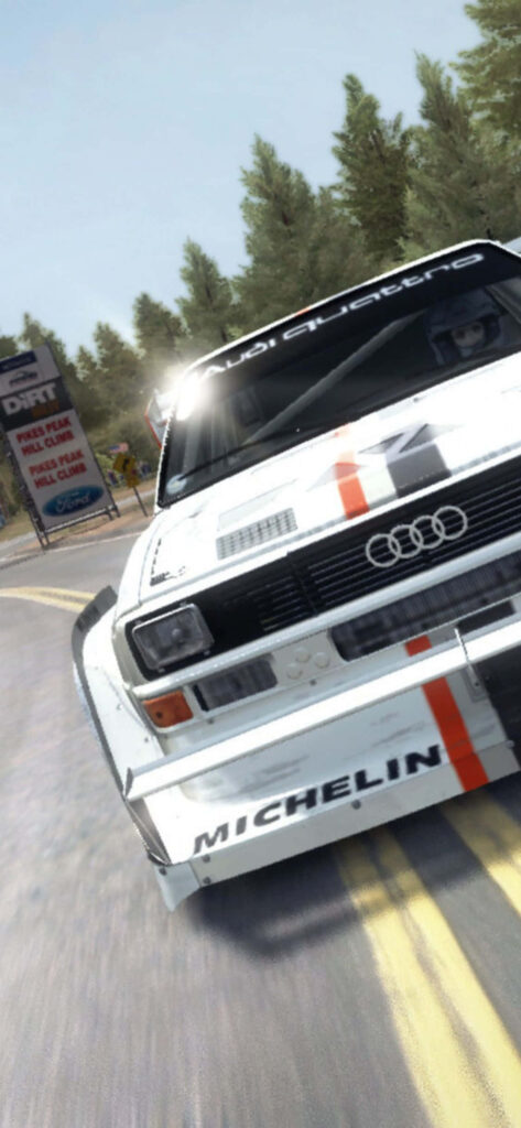 Virtual Classic Audi Rally Car Drifting in Dusty Corner - Rally Racing Simulation Wallpaper