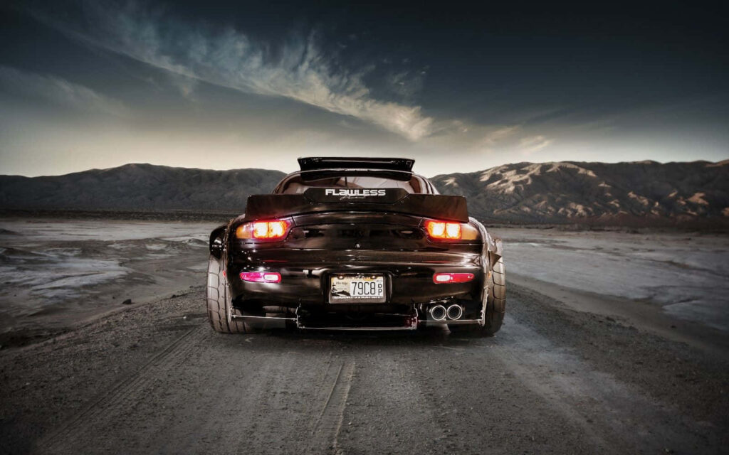 Revving Through Nostalgia: The Timeless Elegance of the Mazda RX-7 FC Wallpaper