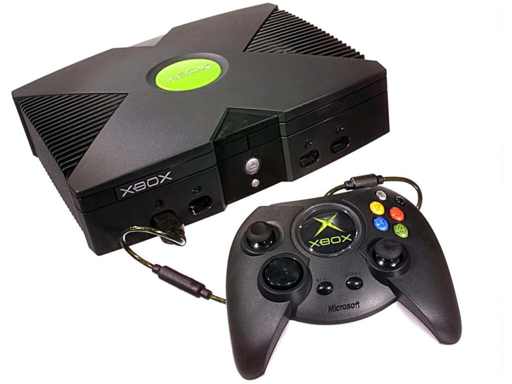 Old Xbox and Controller on a White Background Wallpaper
