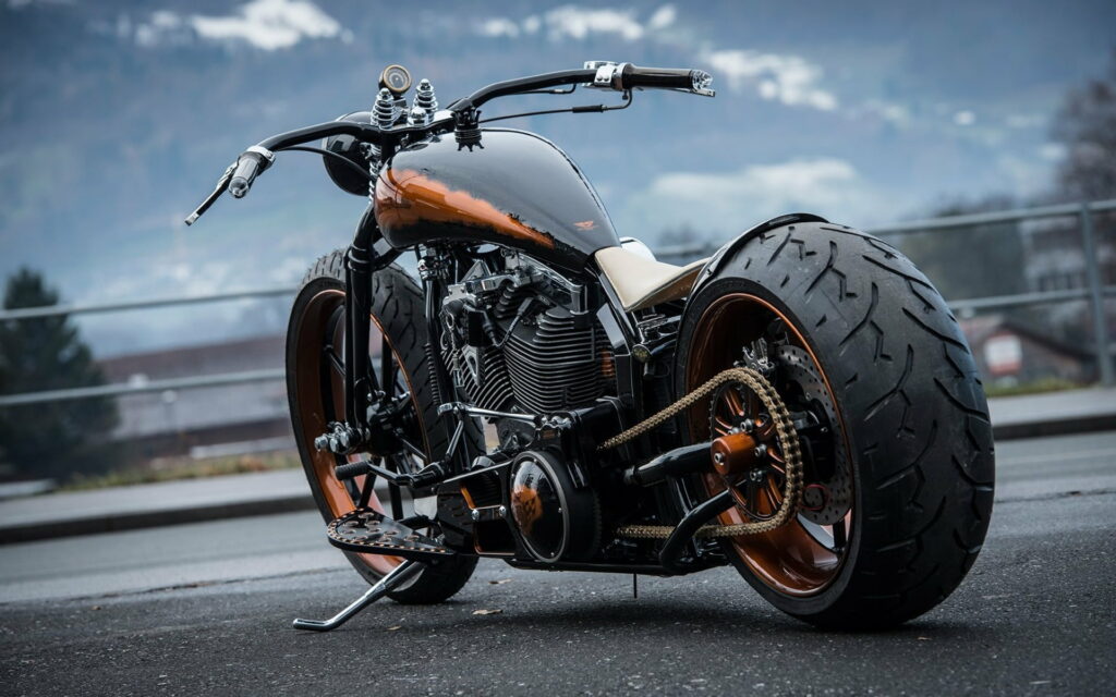 Revamped Ride: A Stunning Custom Chopper Takes Center Stage in this HD Wallpaper