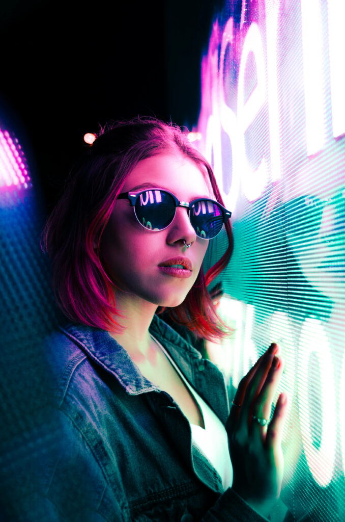 Cruising into Nostalgia: Embrace the Vibe of a Stylish and Adventurous Retrowave Girl with Sun-Kissed Locks and Cool Shades Wallpaper