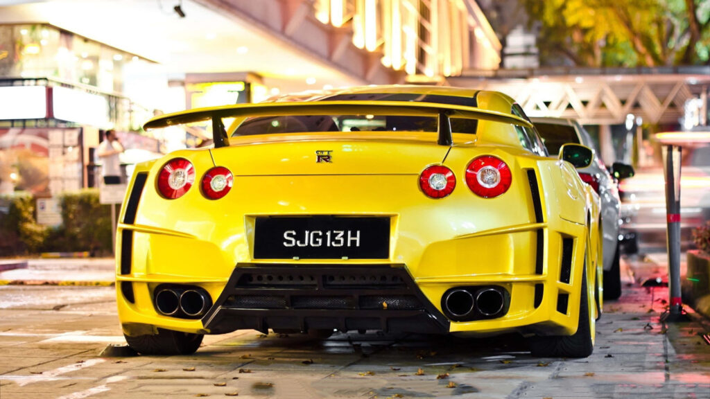Revved Up in Yellow: Stunning Nissan GT-R Desktop Wallpaper in 3840 X 2160
