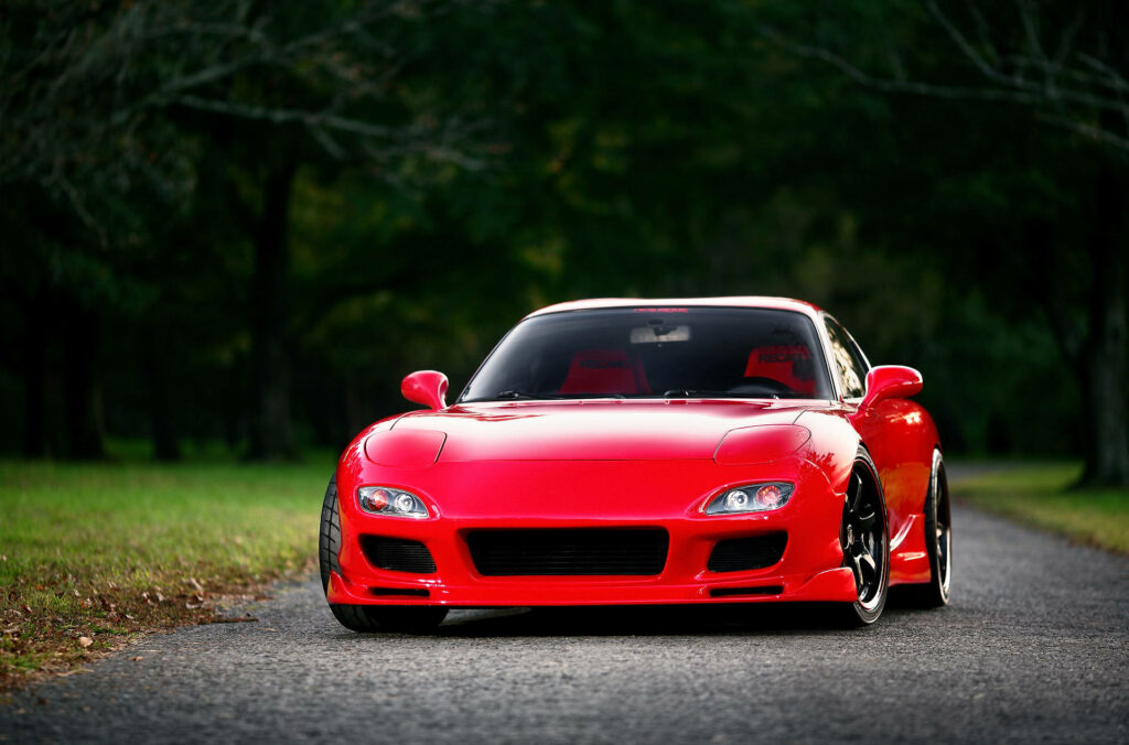 Revving Through Nature: A Vibrant Rx7 Adventure Wallpaper