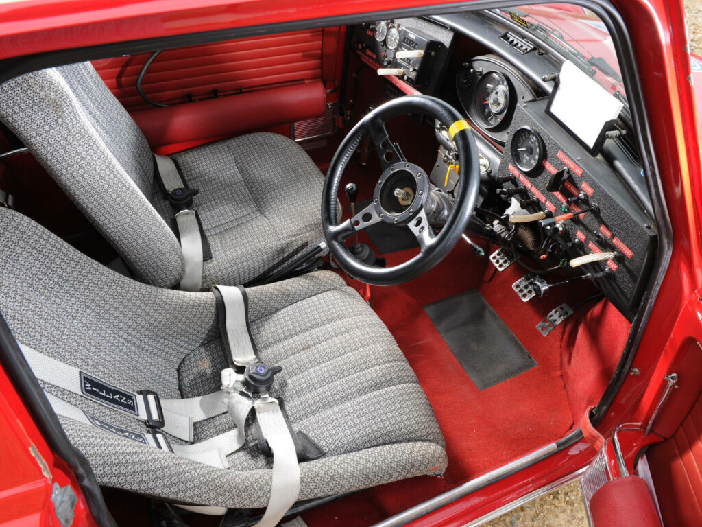 Vintage Rally Car Interior with Bucket Seats, Gauges, and Gear Shift - Adventure Wallpaper