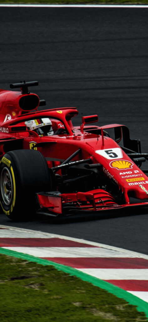 Ferrari F1 Dominating the F1 2018 Circuit with Intense Speed and Passion Wallpaper