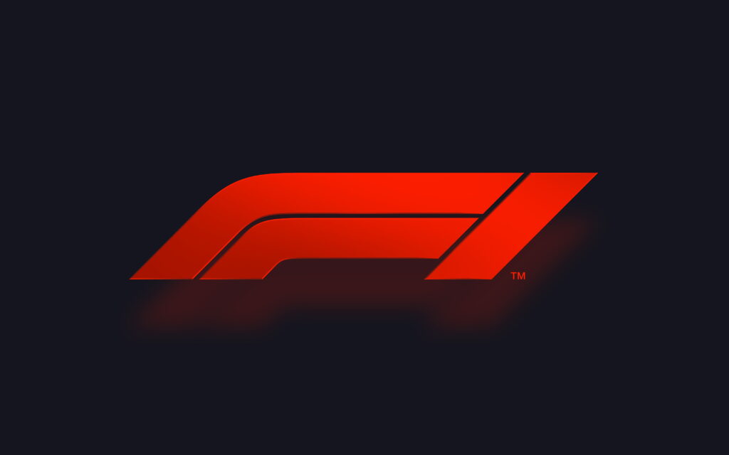 Sleek vibrant red Formula 1 logo on dark charcoal minimalist background 4K 8K racing wallpaper