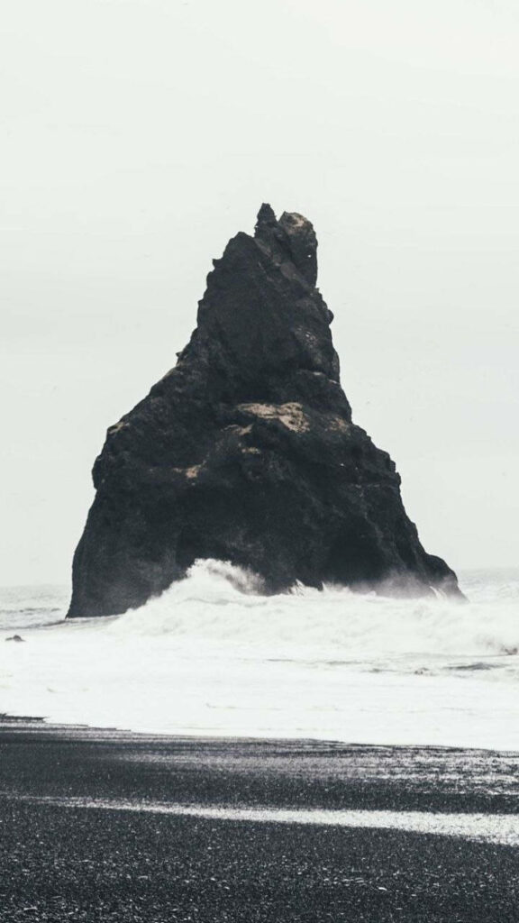 Iceland's Reynisdrangar Sea Stack: Moody iPhone 7 Wallpaper Background