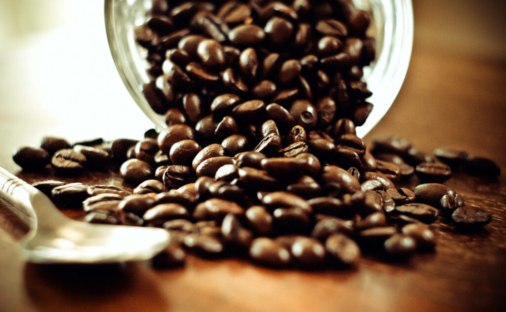 Rich Coffee Beans Wallpaper: Rustic Warm-Toned Background Design