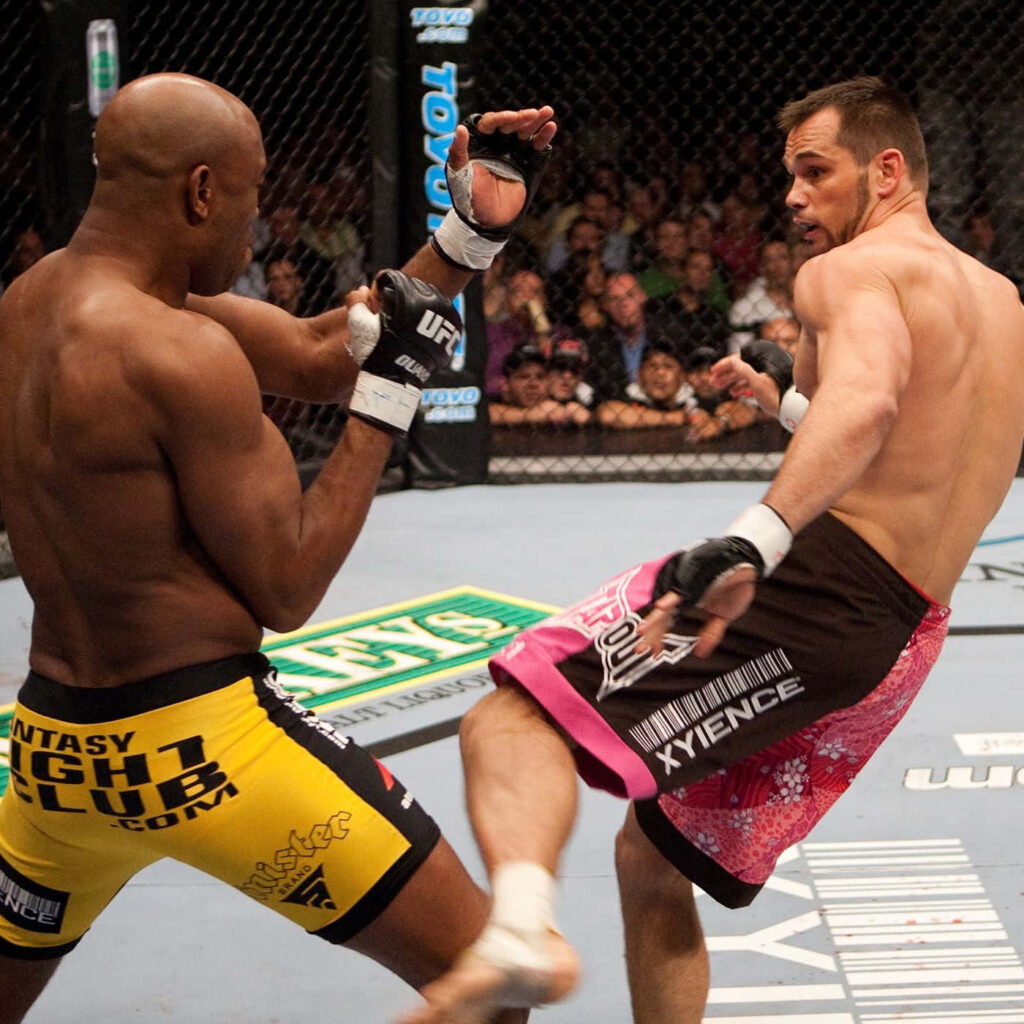 Rich Franklin and Anderson Silva intense UFC title fight exchange inside the octagon wallpaper
