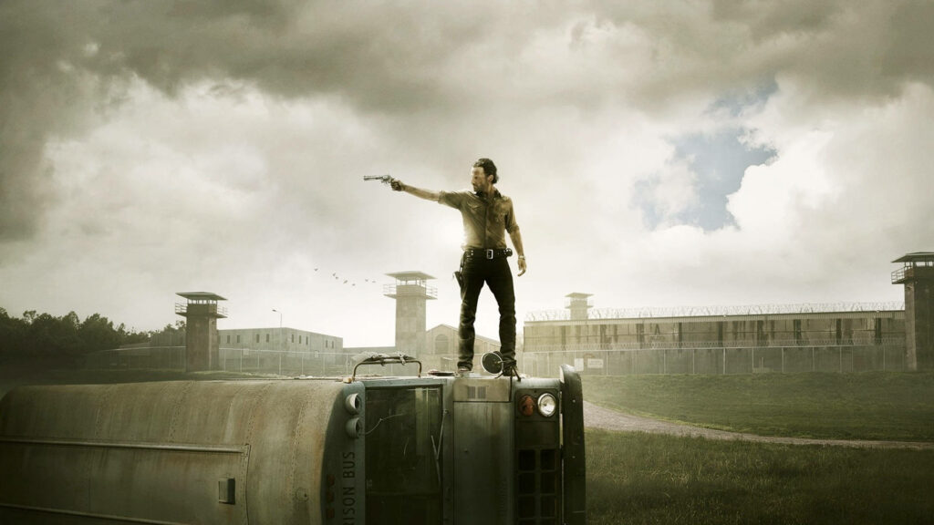 Rick Grimes Wallpaper: Fearless Standoff in The Walking Dead Scene