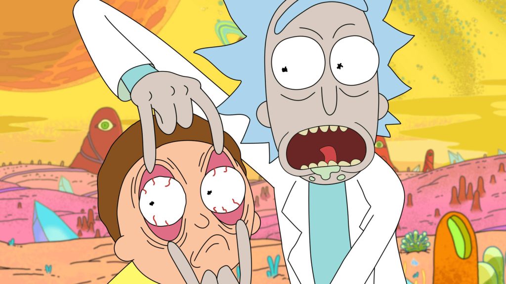 Rick Sanchez holding Morty Smith’s eyes open in chaotic red alien landscape Rick and Morty wallpaper
