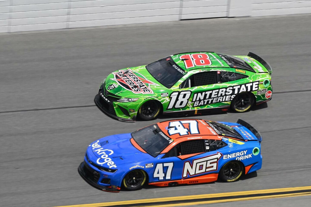 Ricky Stenhouse Jr in blue orange number 47 Kroger NOS Energy Drink car races green Interstate Batteries car Wallpaper