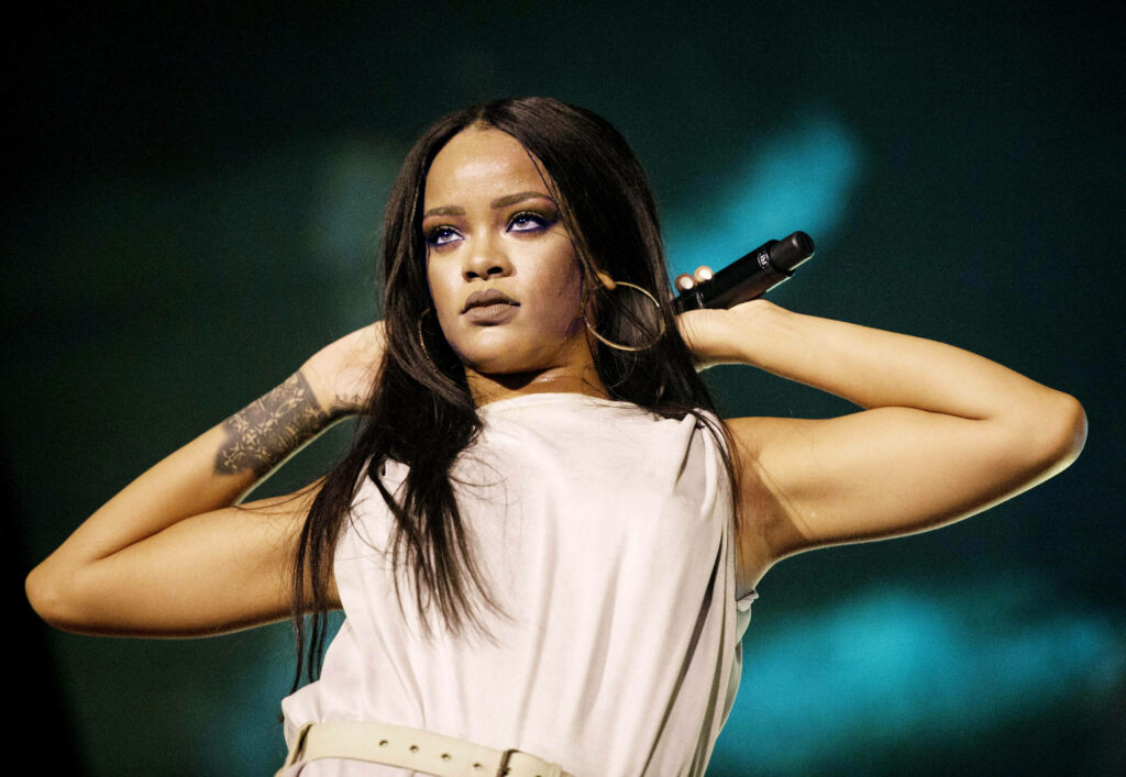 Rihanna HD Concert Wallpaper: Captivating Stage Performance Background