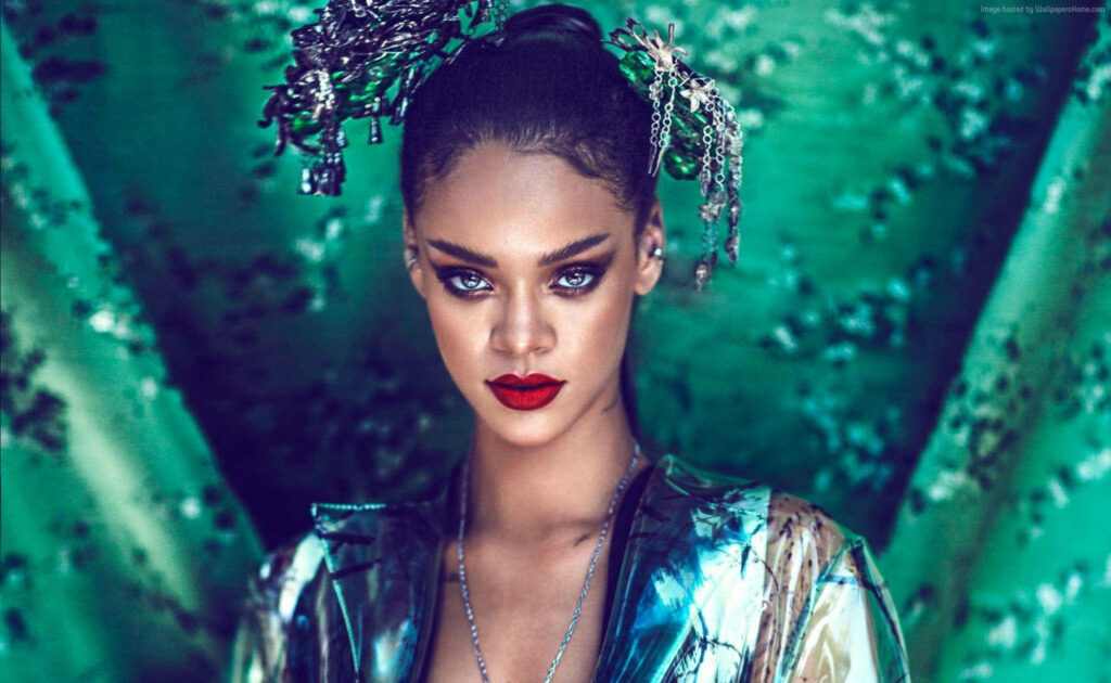 Rihanna Wallpaper: Stunning Pose with Bold Red Lips & Green Background