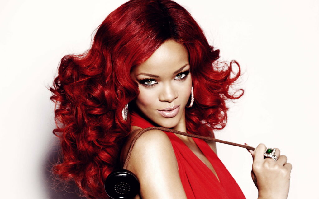 Rihanna's Alluring Red Portrait: A Mesmerizing 4K Wallpaper for Fans