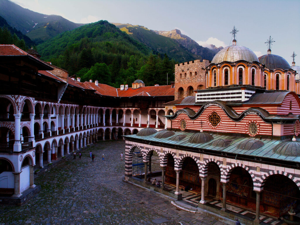 Rila Monastery Bulgaria architecture nestled in green mountains with historic stone walls wallpaper