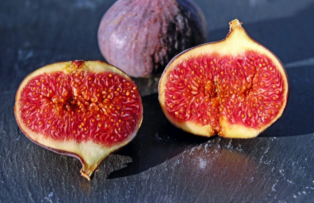 Vibrant Fig Wallpaper: Juicy, Fresh Figs with Dark Textured Skin