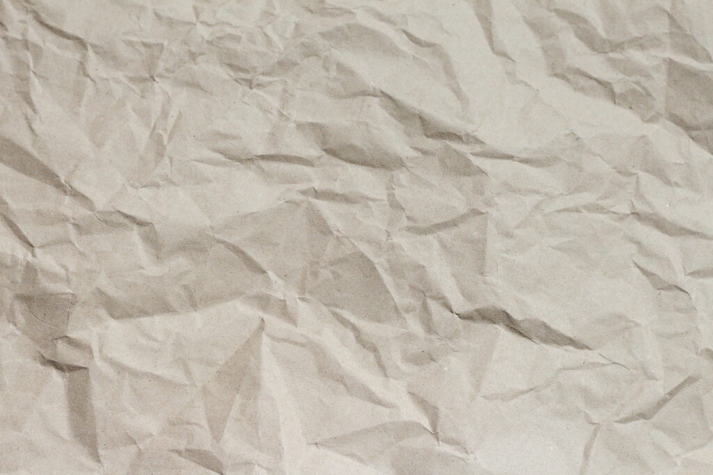 Ripped Leaf Texture on Blank Wrapping Paper with Patterned Background: A Wallpaper Background Photo