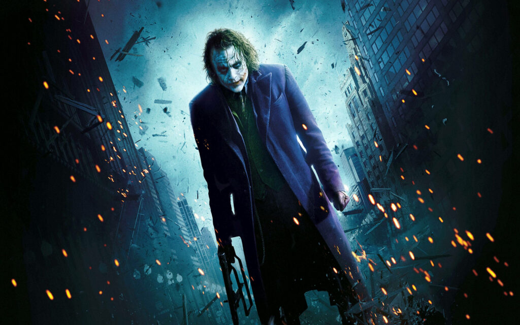 The Flames of the Joker: A Fiery Gotham City Wallpaper in QHD 2K 2880x1800 Resolution