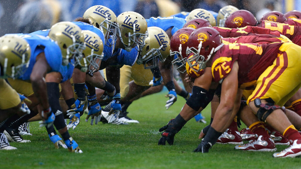 The Ultimate Showdown between UCLA and USC Football Wallpaper