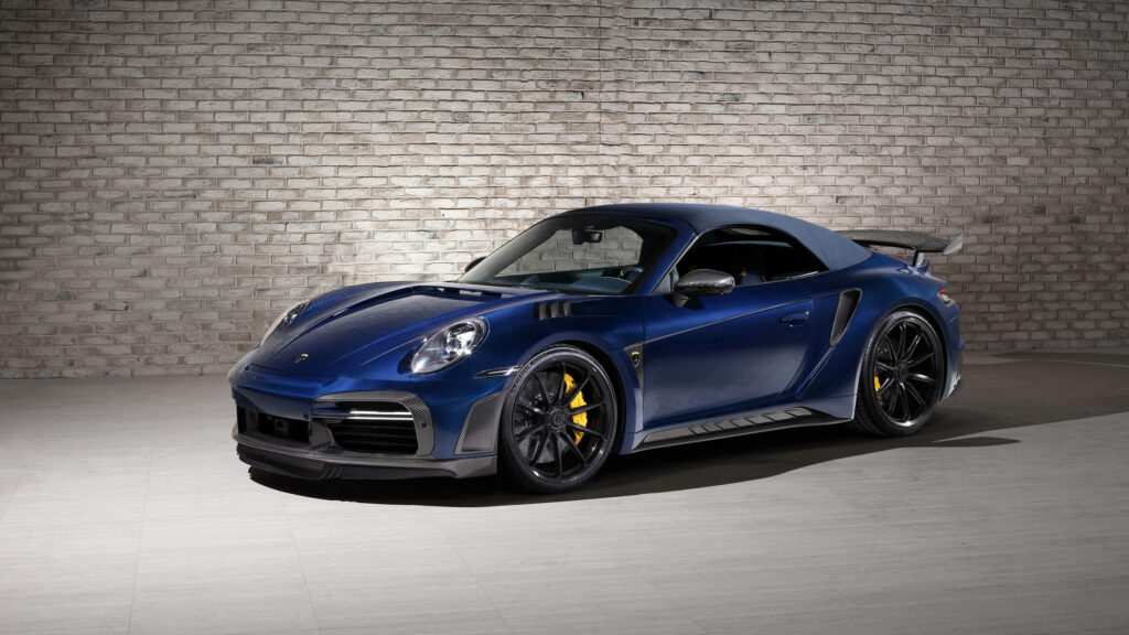 Fierce Elegance: A Dark Blue Porsche Car with Yellow Accents - 5120x1440 Wallpaper Background Photo
