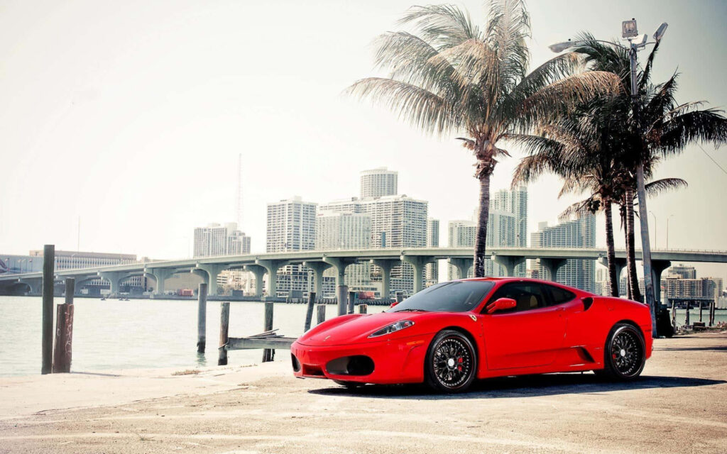 A Thrilling Sight of the Fabulous Ferrari F430: Embodying Power and Elegance on the Open Road! Wallpaper