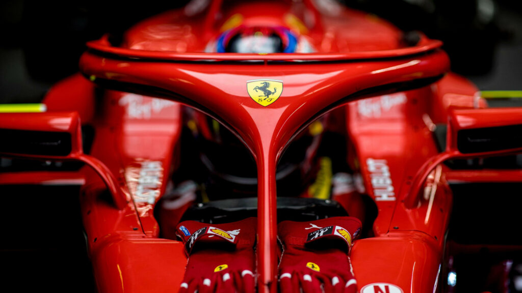 The Iconic Ferrari F1 2018: A Captivating Front View Highlighting the Brand's Legendary Logo Wallpaper