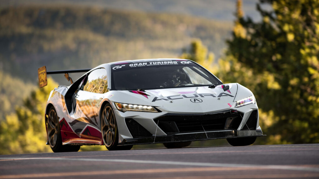Revved Up in 8k: A Spectacular Acura Integra Rallying Through Urban Streets Wallpaper