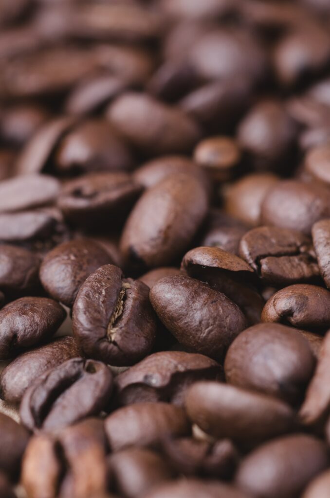 Close-Up Macro Wallpaper of Rich Roasted Coffee Beans Texture