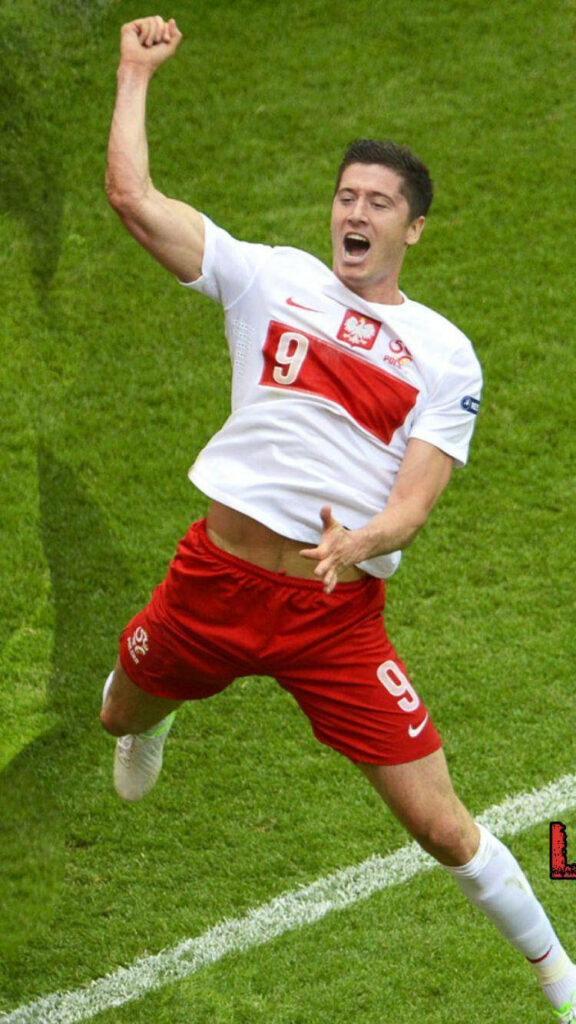 Joyful Robert Lewandowski Jumping Wallpaper Background
