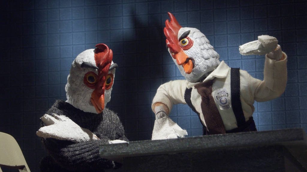 Robot Chicken stop-motion wallpaper with police officer chicken and skeptical partner in office
