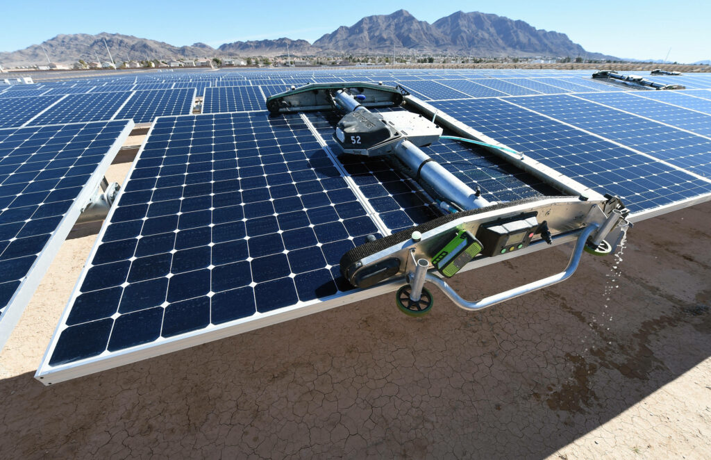 Robotic Solar Panel Cleaning System at NV Energy Solar Farm Wallpaper