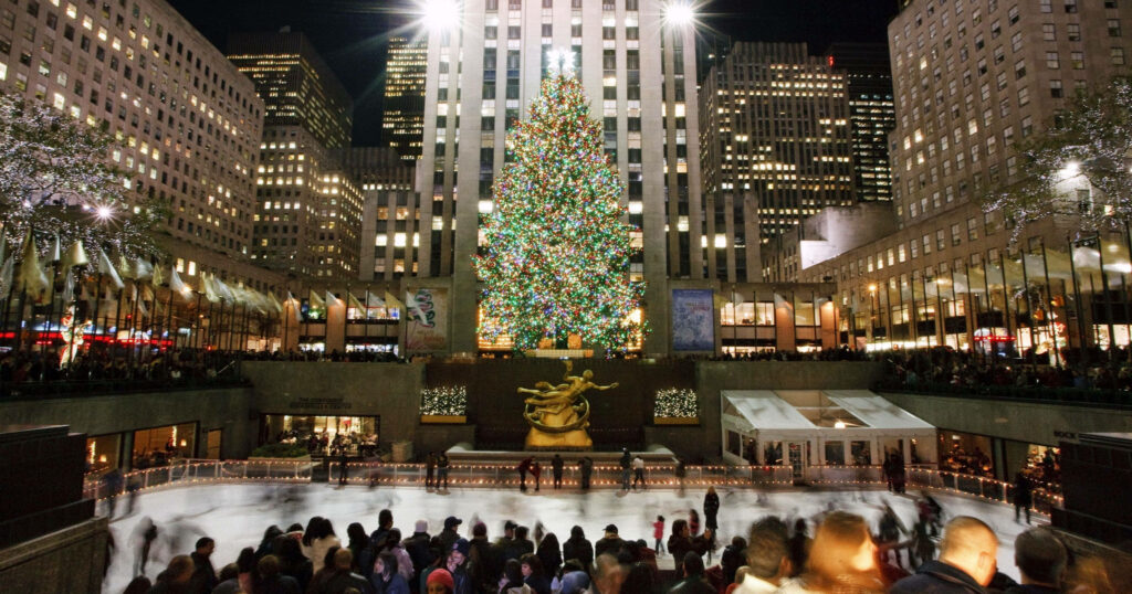 Iconic Rockefeller Center Christmas Tree & Ice Skating Festivities Wallpaper