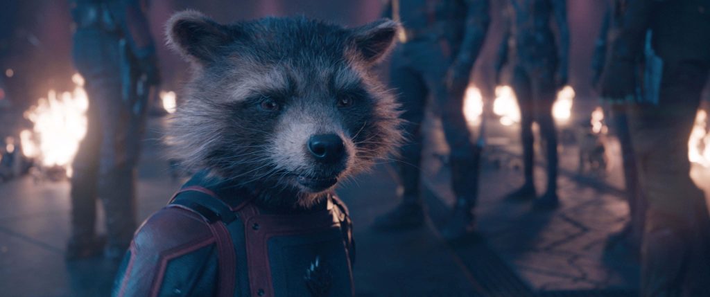 Rocket Raccoon in tactical suit with glowing flames dark silhouettes cinematic wallpaper background
