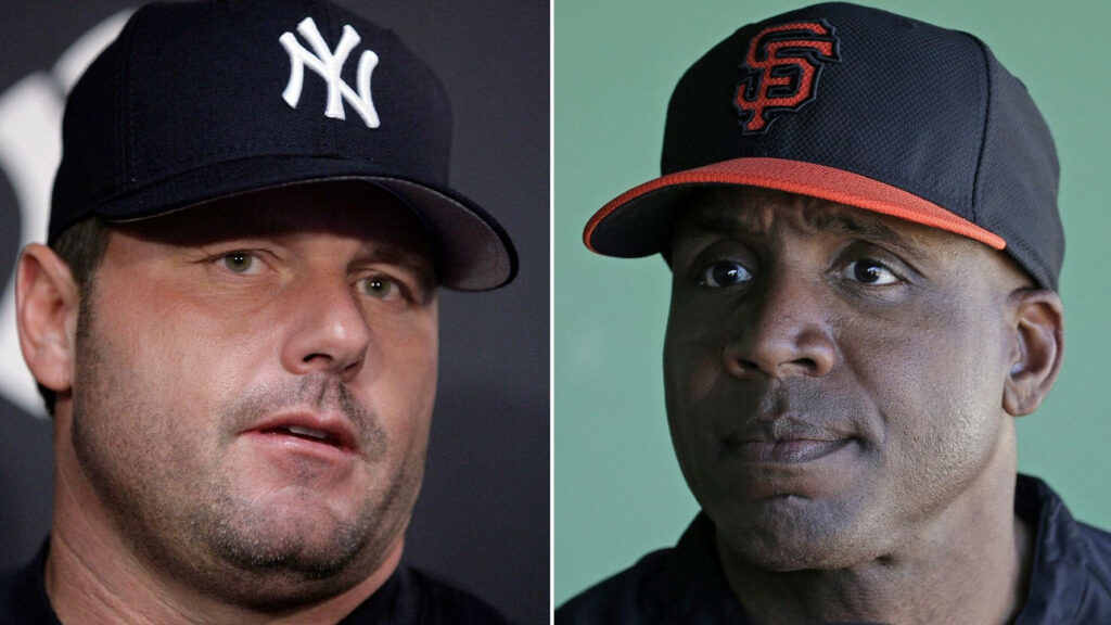 Close-up wallpaper of baseball legends Roger Clemens Yankees and Barry Bonds Giants caps
